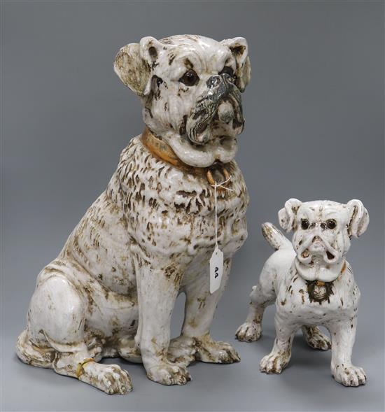 Two white glazed terracotta dogs tallest 42.5cm